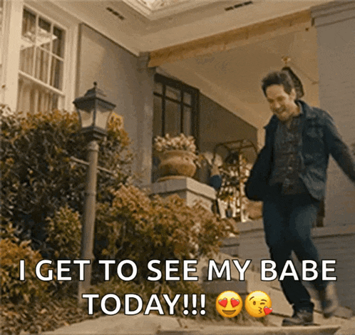 a man walking down a set of stairs with the words " i get to see my babe today "