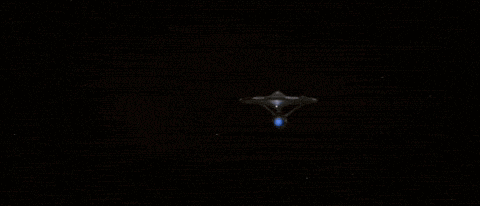 a space ship with a blue light on the front