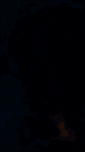 a purple lightning bolt strikes against a dark background