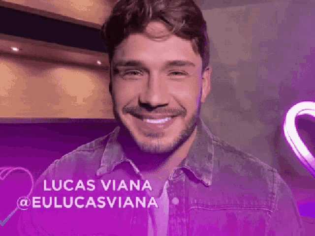 a man with a beard is smiling with the name lucas viana at the bottom