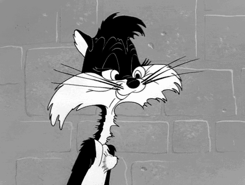a black and white drawing of a cartoon cat