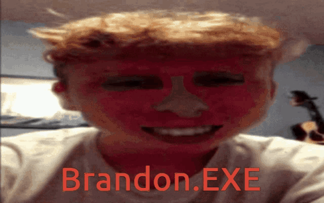 a boy with red paint on his face has brandon.exe written in red