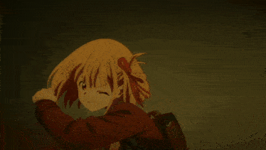 a man in a red shirt with the letter f on it is laying on the ground