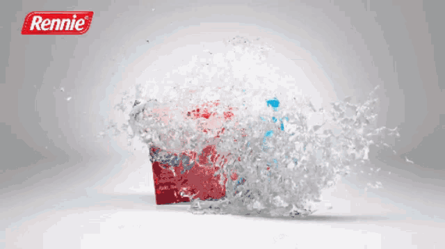 a box of rennie digestif is being sprayed by water