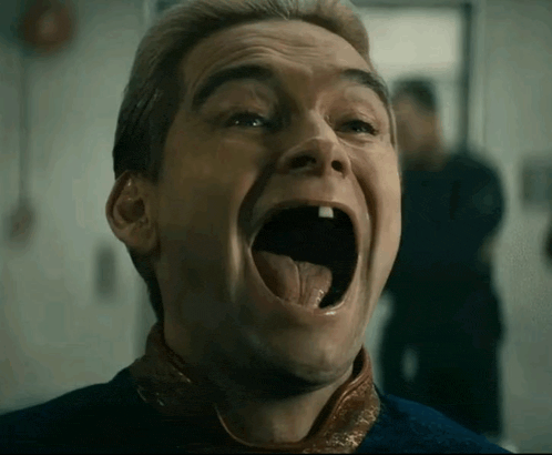 a man is making a funny face with his mouth wide open