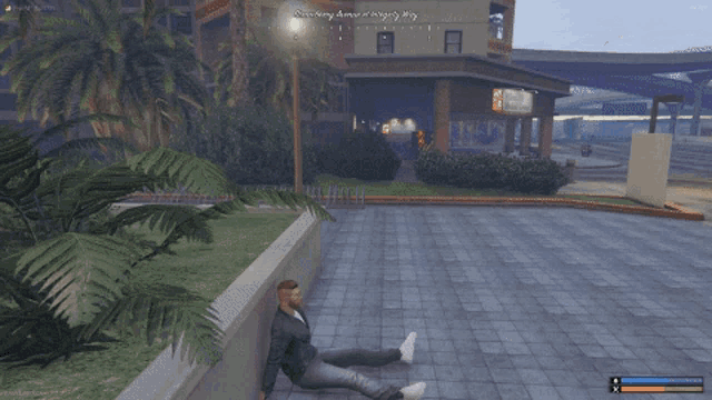 a screenshot of a video game shows a man sitting in a waiting room