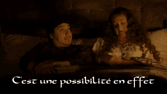 a man and woman laying in bed with the words cest une possibilite en effet