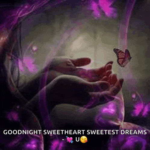 a person holding a butterfly in their hands with a message that says goodnight sweetheart sweetest dreams