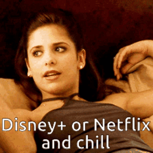 a woman laying on a bed with the words " disney + or netflix and chill " on the bottom