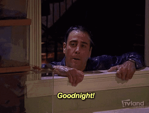a person looking out a window with the words goodnight written on the bottom