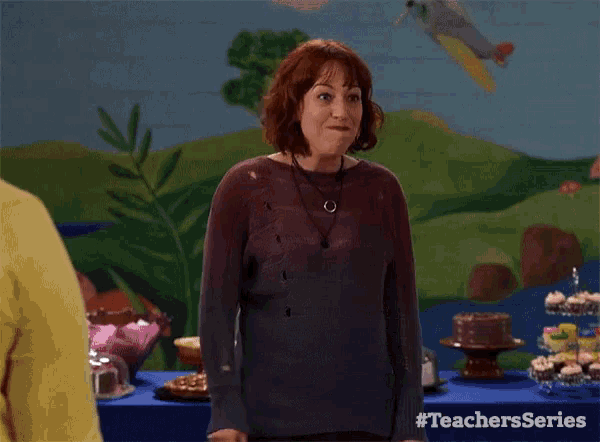 a woman says " i feel so loved and so lucky " while standing in front of a table