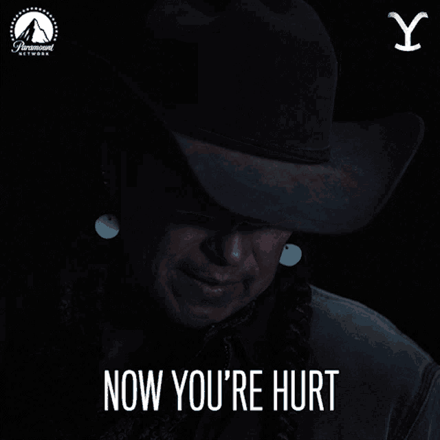 a picture of a man in a cowboy hat with the words now you 're hurt