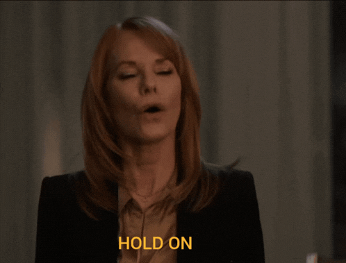 a woman says hold on in a close up