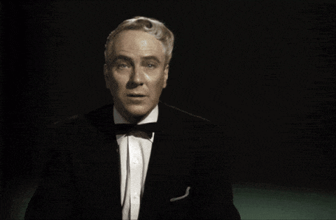 a man in a tuxedo and bow tie says god help us in the future