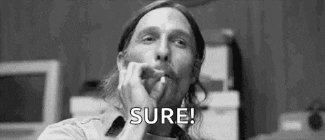 a man is smoking a cigarette in a black and white photo and says `` sure '' .
