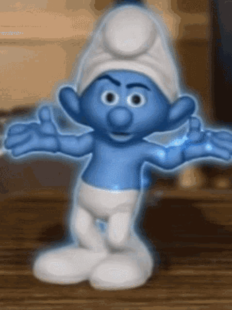 a smurf with his arms outstretched and a white hat