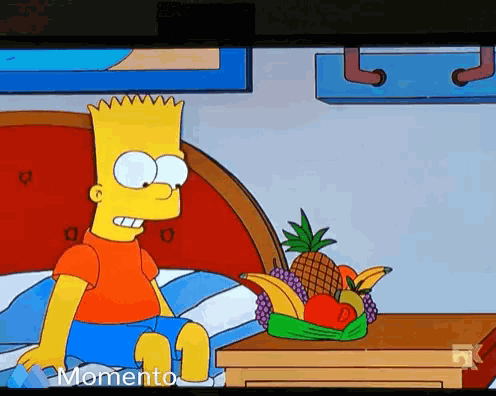 bart simpson is sitting on a bed next to a fruit basket