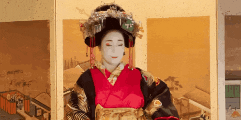 a painting of a geisha with a red kimono