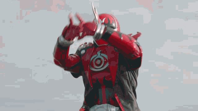 a red circle with a skull on it is surrounded by smoke
