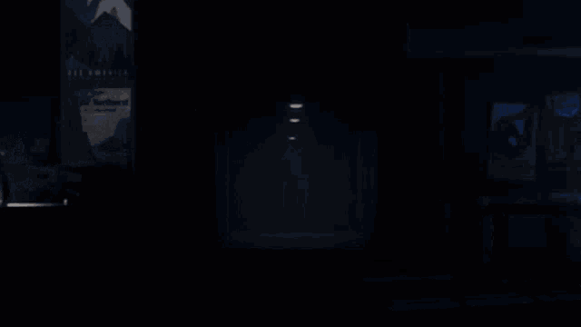 a dark hallway with a poster that says see america on it