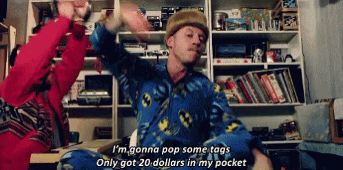 a man in a batman pajama says " i 'm gonna pop some tags "
