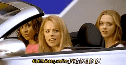three women are sitting in a car with the words `` get in loser , we 're gaming '' on the side .