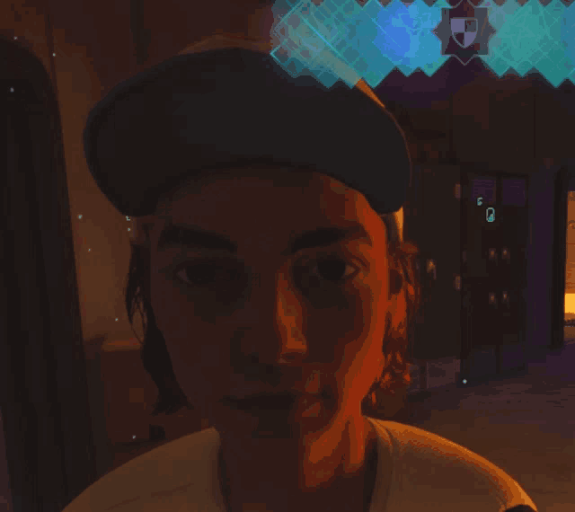 a person in a dark room with a shield on the wall behind them