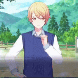 a boy with blonde hair is wearing a blue vest and a white shirt