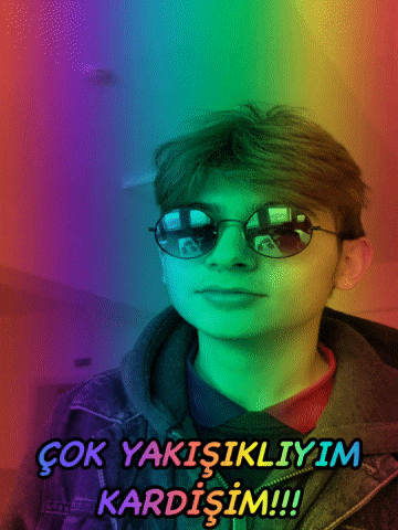 a young man wearing sunglasses with a rainbow background and the words çok yakisiklik kardim
