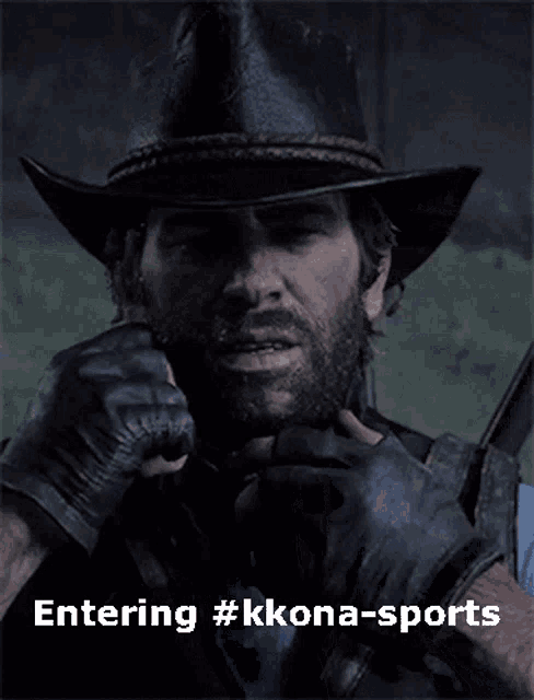a man in a cowboy hat covering his face with his hand and the words entering #kkona-sports