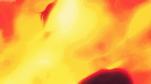 a close up of a person 's face surrounded by flames .