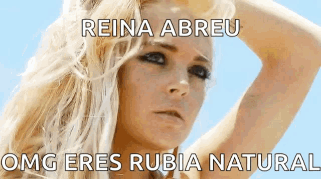 a picture of a blonde woman with the words reina abreu omg eres rubia natural
