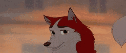 a man is holding a pregnant woman 's belly while a wolf looks on .