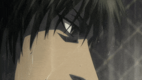 a close up of a man 's face with a white eye and black hair