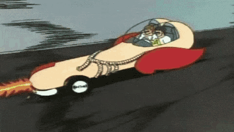 a cartoon character is driving a car with a flame coming out of it 's mouth .