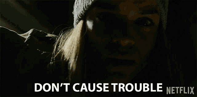 a woman wearing a hat says " don 't cause trouble netflix "