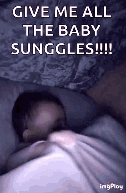 a baby is sleeping in a bed with a caption that says give me all the baby sunggles