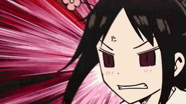 a close up of a cartoon character with a very angry look on her face .