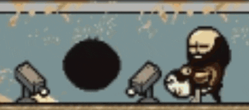 a man with a beard is standing in front of a black ball in a game .
