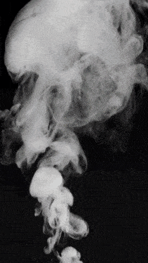 a black background with white smoke coming out of the bottom