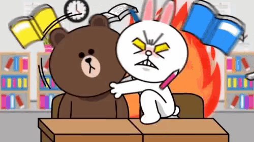 a brown bear and a white rabbit are sitting at a desk in a classroom surrounded by books .