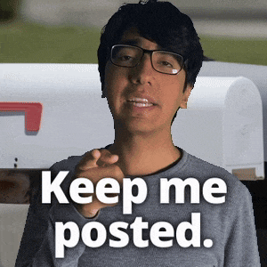 a man with glasses says keep me posted while pointing