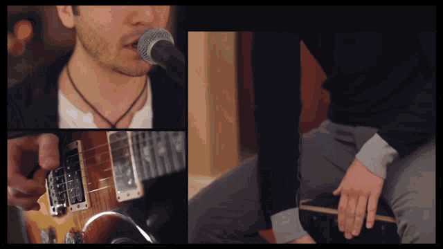 a man singing into a microphone with a guitar in the background
