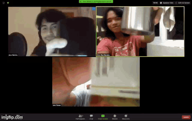 a group of people are on a zoom call and one of them is wearing a red shirt that says ' i love you '