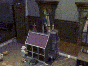 a doll house with a purple roof and a cross on top