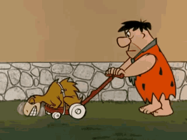 a cartoon of flintstone pushing a toy dog on a lawn mower .