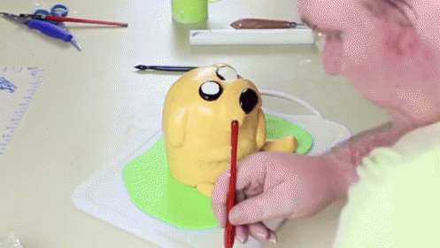 Making A Jake Cake GIF - Jake Cake Adventure Time GIFs
