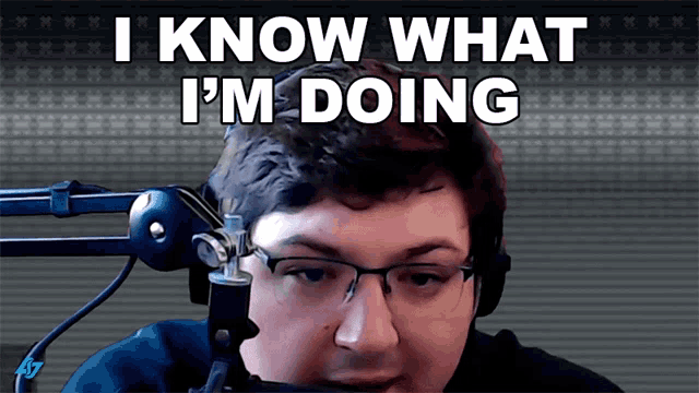 a man wearing headphones and glasses says i know what i 'm doing