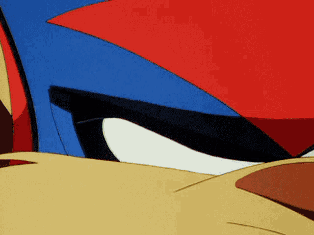 a close up of a cartoon character 's face with a blue and red cape on