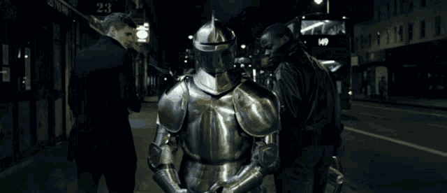 a knight in armor stands in front of a bar sign